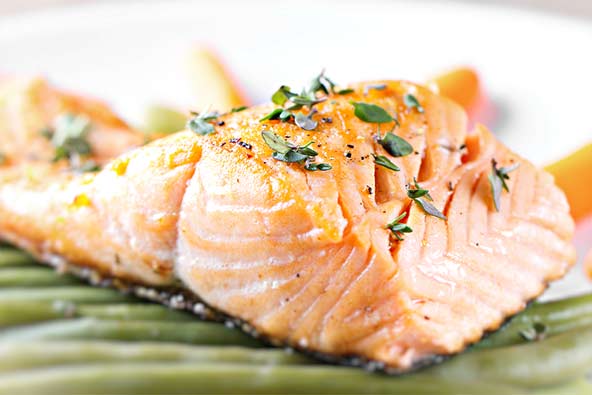 A close up of a plate with salmon